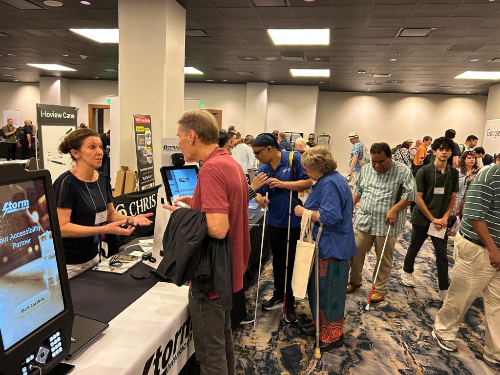 Nicky Shaws at the Storm Interface booth during the 2026 NFB Convention.